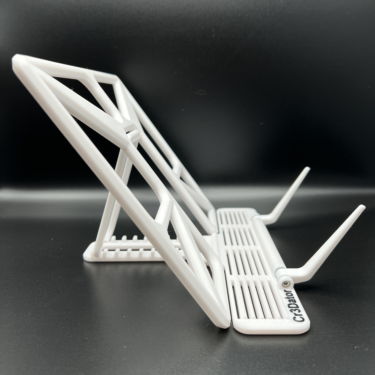 Buchständer weiß in der Seitenansicht